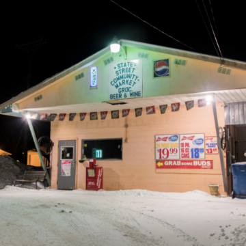Professor of art and wife purchase State Street Market