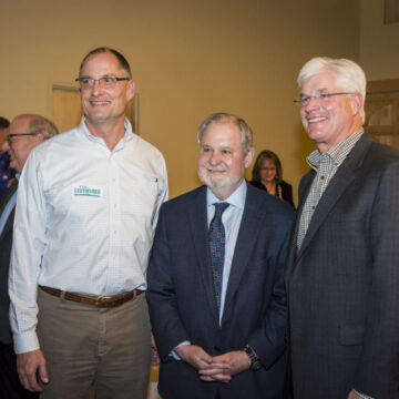 Dr. Arnn stands with local politicians Eric Leutheuser and Mike Shirkey