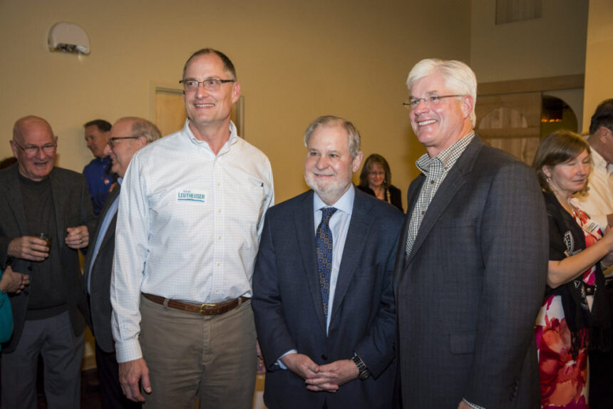 Dr. Arnn stands with local politicians Eric Leutheuser and Mike Shirkey