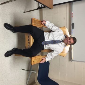 Coach Otterbein given chair by team at end of season banquet