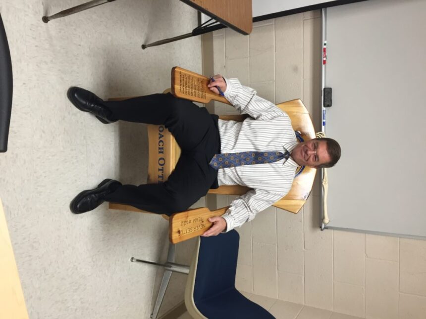 Coach Otterbein given chair by team at end of season banquet