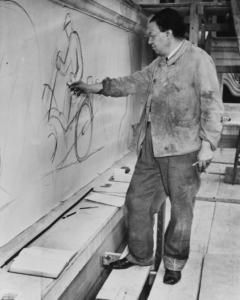 Diego Rivera sketching out his famous "American Industry Murals."