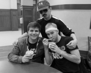 Freshman Brendan Noble and sophomore Josh Hamilton with freshman Brant Cohen, eating Michigan Pot Hole ice cream. (Breana Noble/Collegian)