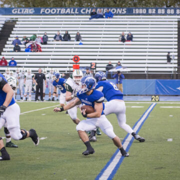 Football fights through rain for second straight win