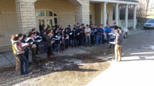 Sophomore Jonathan Edelblut directs members of musical fraternities in a rehearsal for the Mu Alpha Concert. Jonathan Edelblut | Courtesy 