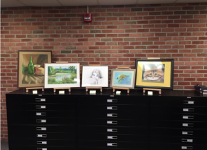Freshman Lauren Schlientz and junior Faith Lamb won Mossey Library’s first art show. Evan Carter | Collegian 