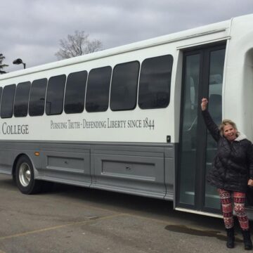 jodi bus Driving athletes with Charger pride