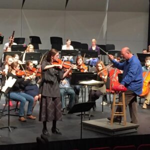 Junior Rachelle Ferguson rehearses with the Hillsdale College Symphony Orchestra. She and fellow concerto competition winner sophomore Gregory Farison will perform their winning pieces at the orchestra concert this Saturday and Sunday. Lillian Quinones | Collegian