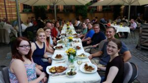 Geyer and his German students enjoy a meal during a German summer trip. 