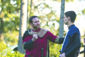 Assistant Professor of Politics Adam Carrington and junior Nick Baldwin rehearse for this weekend’s production of “Macbeth.” Madeline Barry | Collegian