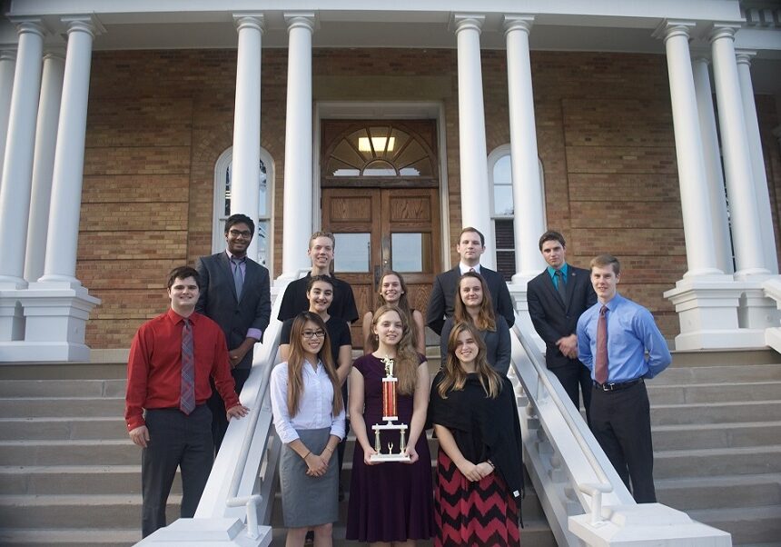 Debate finishes first at opening competition