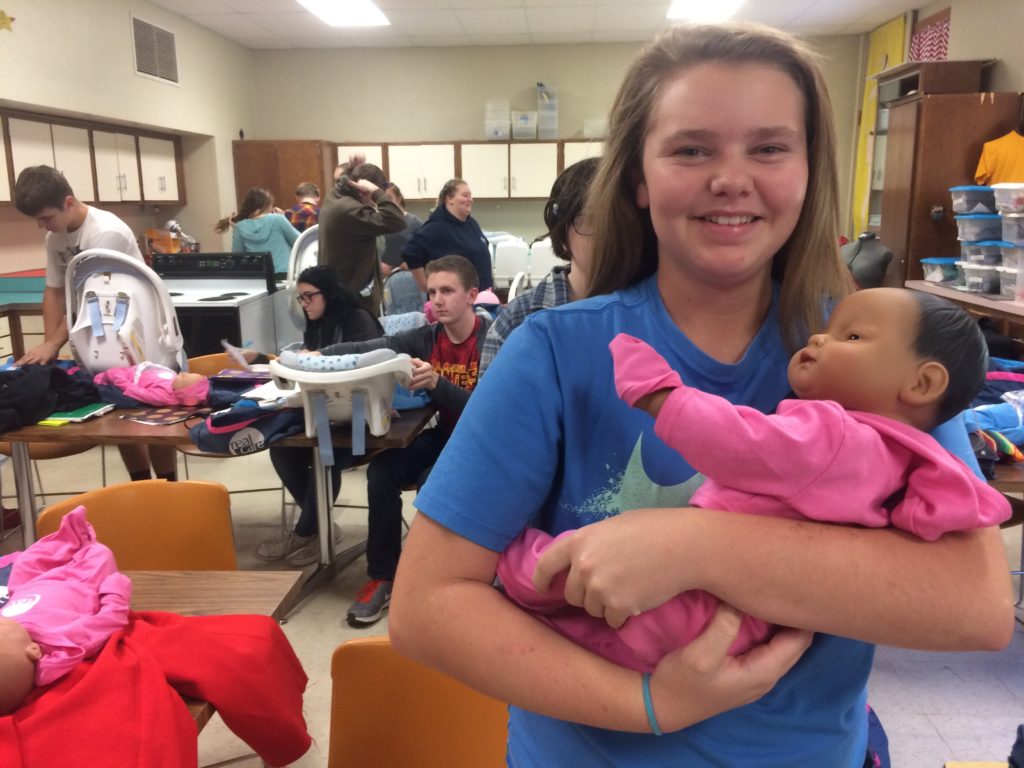 ‘It’s a boy! It’s a girl!’ Teen students care for baby simulators in parenting class