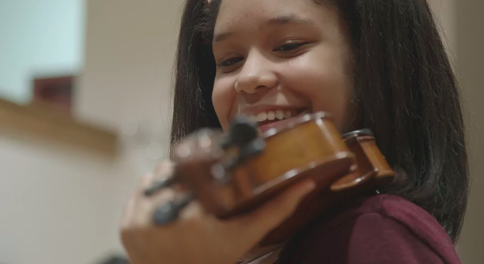 Alumna music teacher shares Oscar-nominated documentary ‘Joe’s Violin’