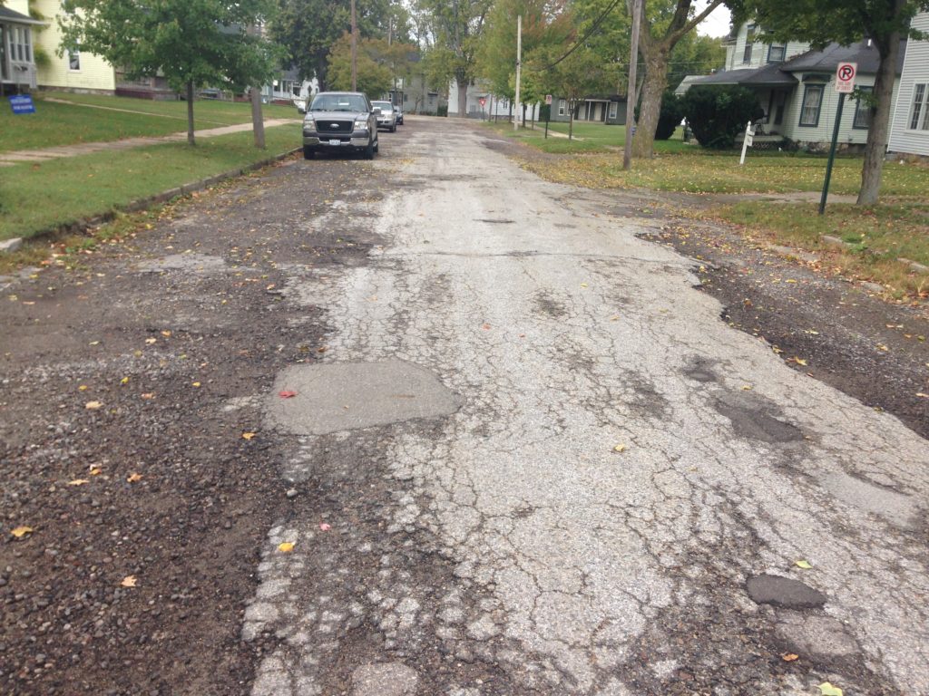 Mayoral candidates pledge different paths to paved roads
