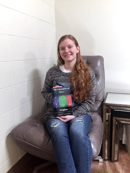 Origins of a trilogy: freshman author publishes first novel