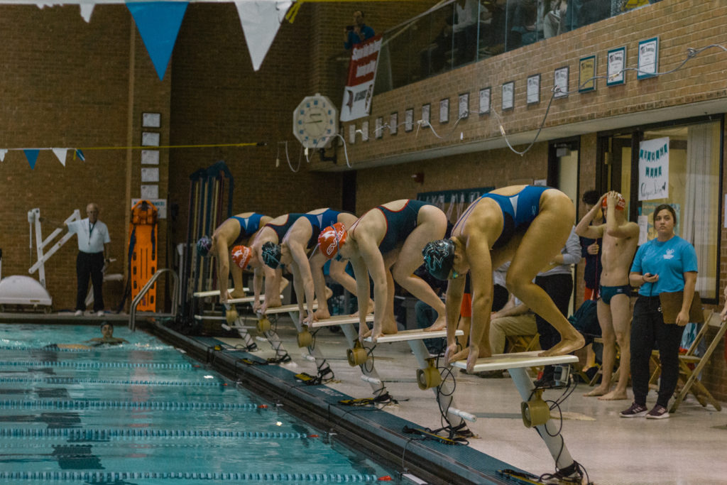Final two home meets feature team win, pool’s relay record