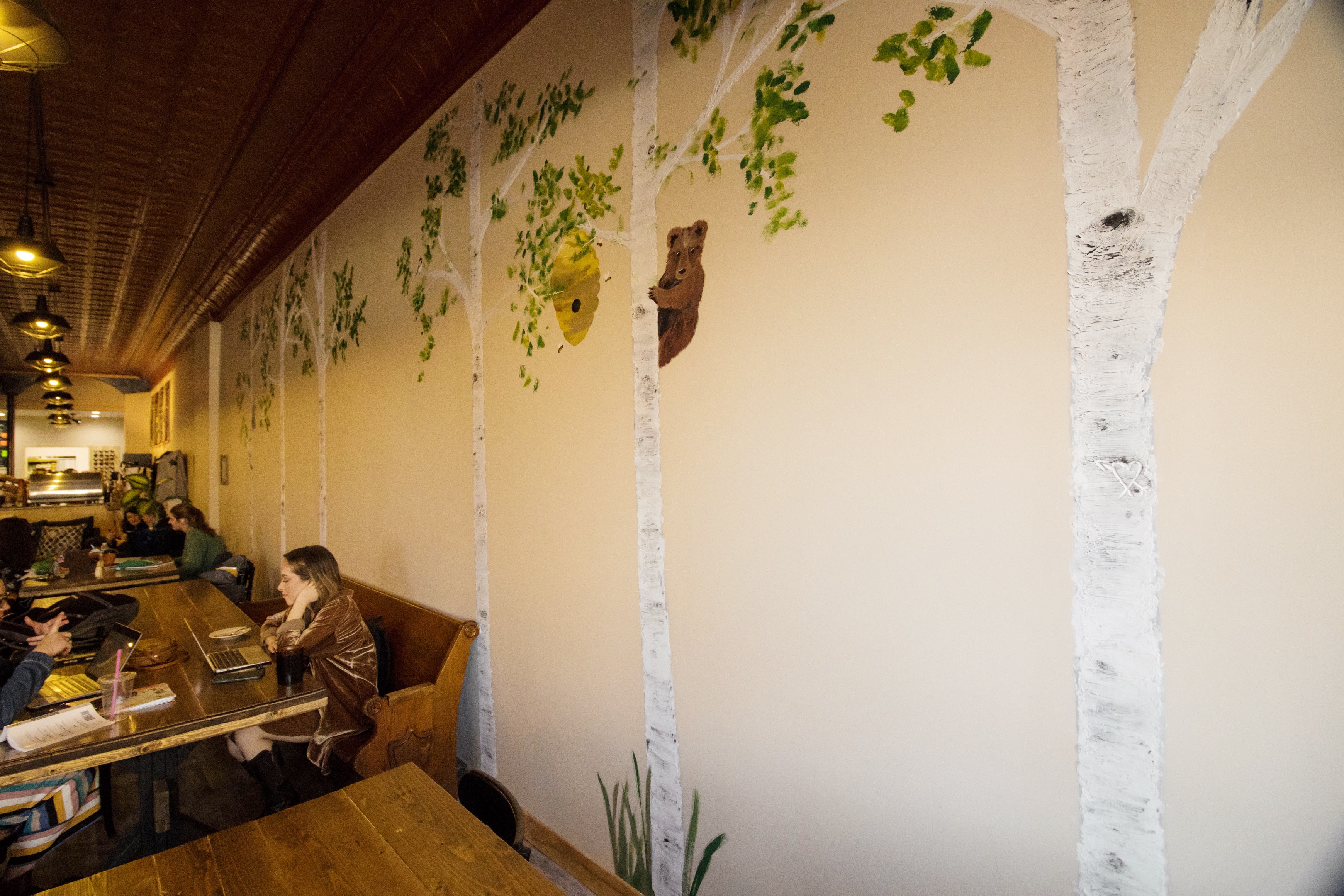 Local artist spruces up Jilly Beans with murals