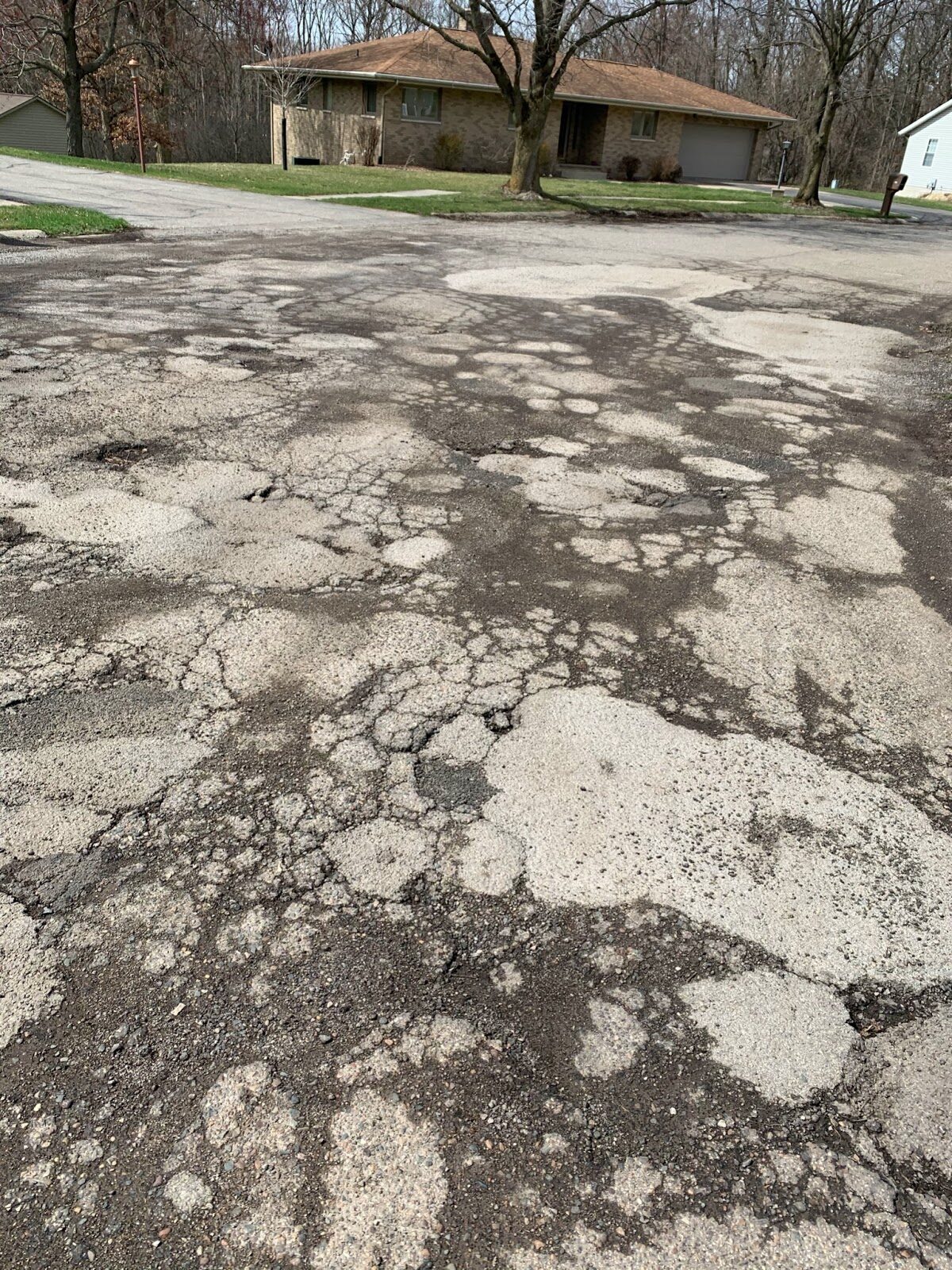 Study rates MI third worst for potholes in nation, officials plan road repairs.