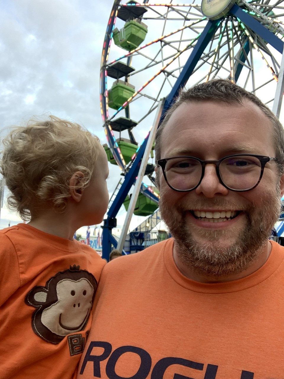 Ian Church holds his son at the Hillsdale County Fair. Courtesy | Ian Church