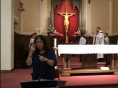 Susan Shirk interprets a Mass at St. Anthony’s. Courtesy | Susan Shirk