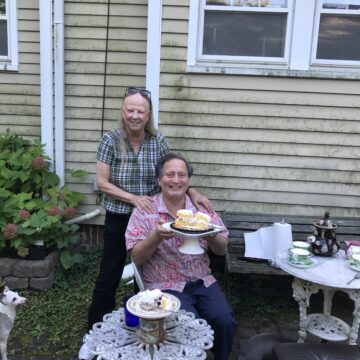 Former Hillsdale College Spanish Professor Sandra Puvogel and former Spanish lecturer Javier Barrios enjoy cake.
