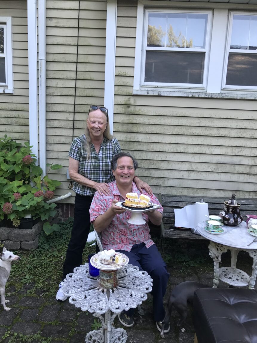 Former Hillsdale College Spanish Professor Sandra Puvogel and former Spanish lecturer Javier Barrios enjoy cake.