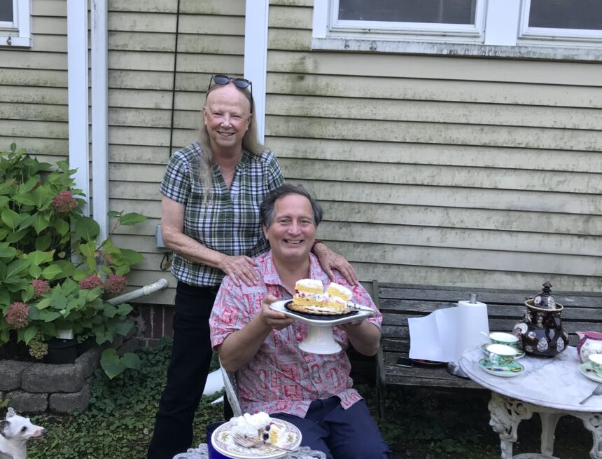 Former Hillsdale College Spanish Professor Sandra Puvogel and former Spanish lecturer Javier Barrios enjoy cake.
