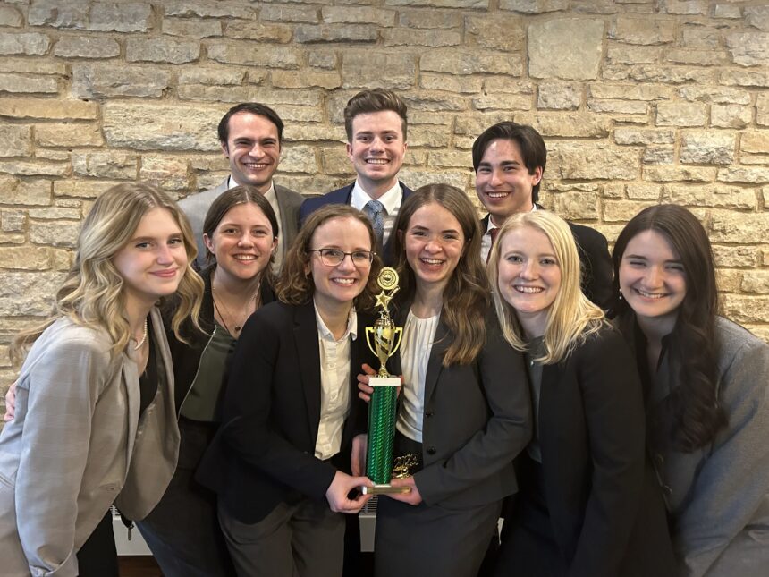 Debate team members advance to final tournament rounds