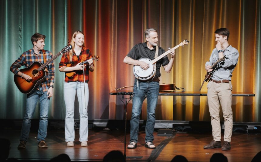 Professors perform for students at Faculty Revue