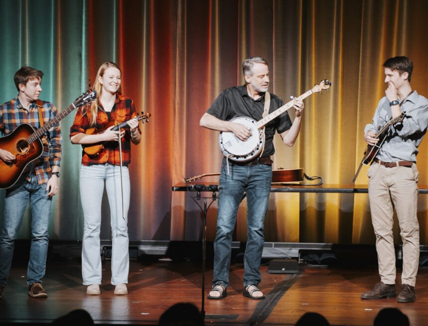 Professors perform for students at Faculty Revue