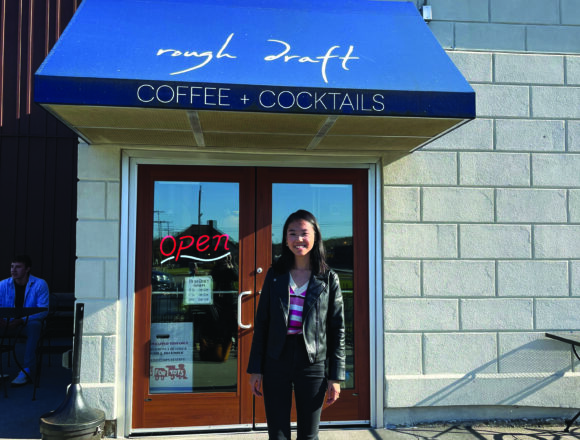 Emma De Nooy stands in front of Rough Draft. Courtesy | Emma De Nooy