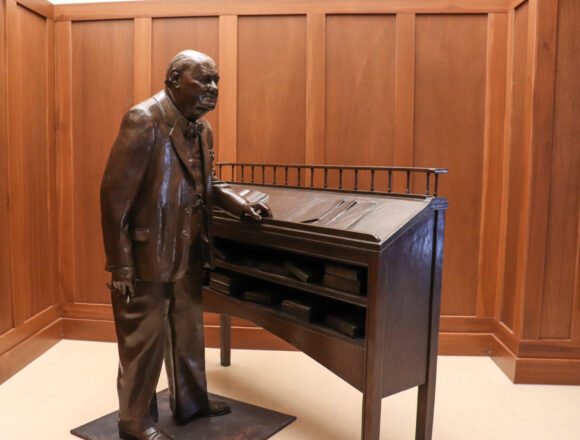 A statue of Winston Churchill stands on the Liberty Walk in the Grewcock Student Union. Olivia Pero | The Collegian