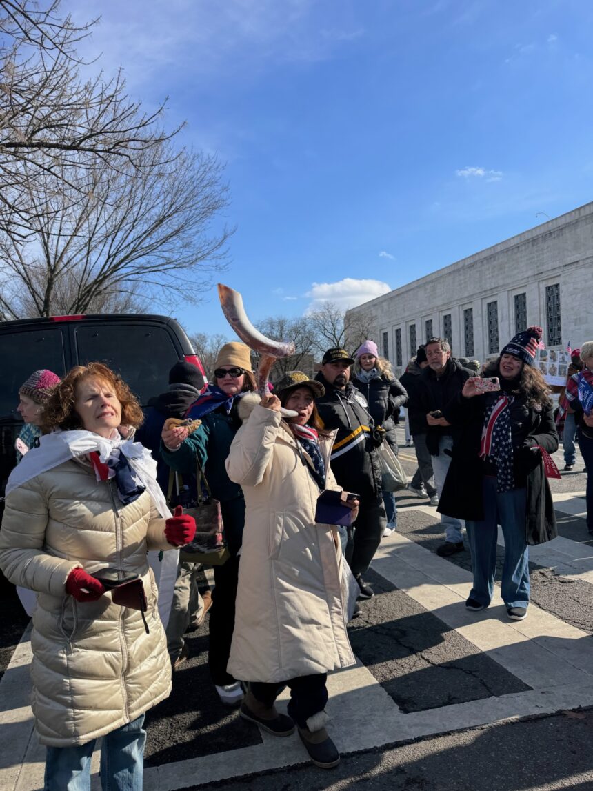 Inauguration moves inside: American spirit persists
