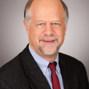 Economics professor speaks on national bank, Hamilton and Jefferson