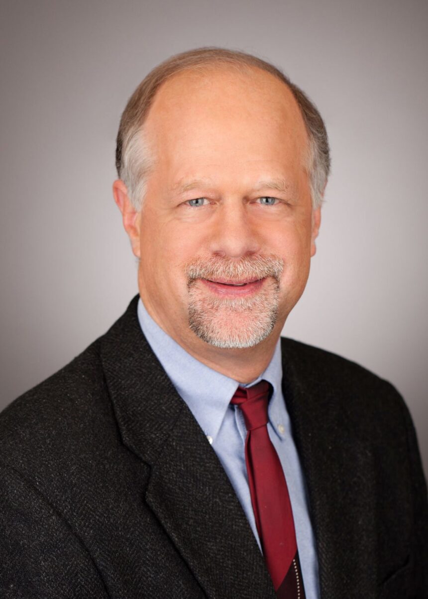 Economics professor speaks on national bank, Hamilton and Jefferson