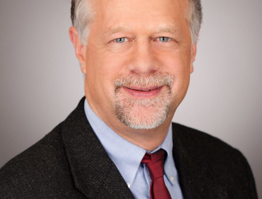 Economics professor speaks on national bank, Hamilton and Jefferson