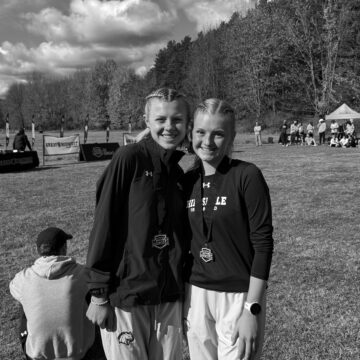 Kuzma and Clark pose with their medals Courtesy | Anna Roberts Kuzma wins, teams place fourth and fifth