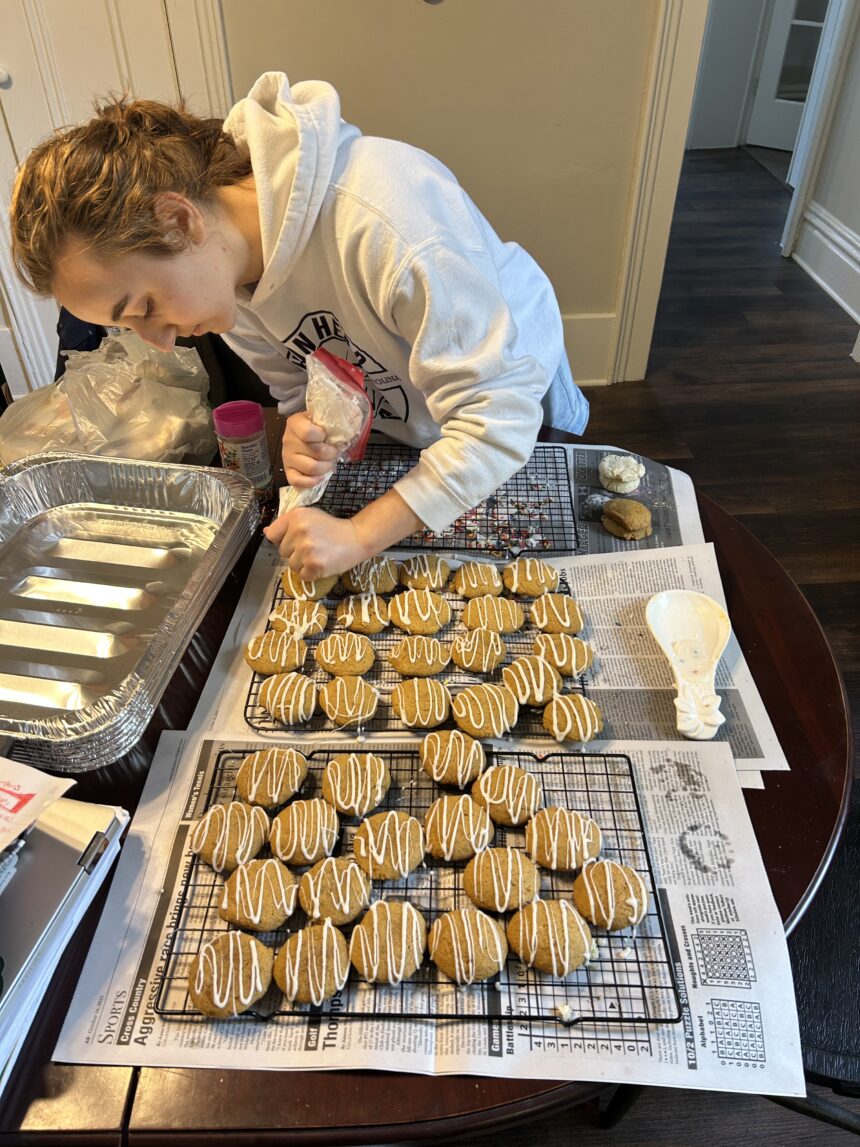 Students exchange textbooks for oven mitts in preparation for Maker’s Market