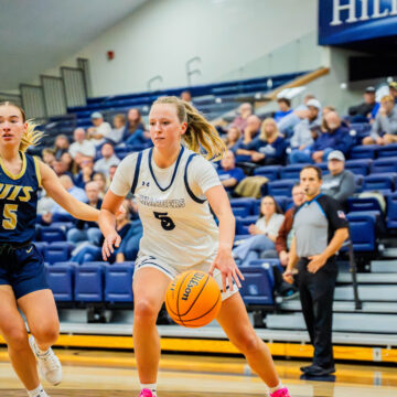 Women sweep at home, curbed on road