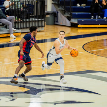 Men rebound with win at home