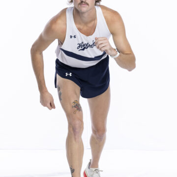 Kuhn crushes mile record