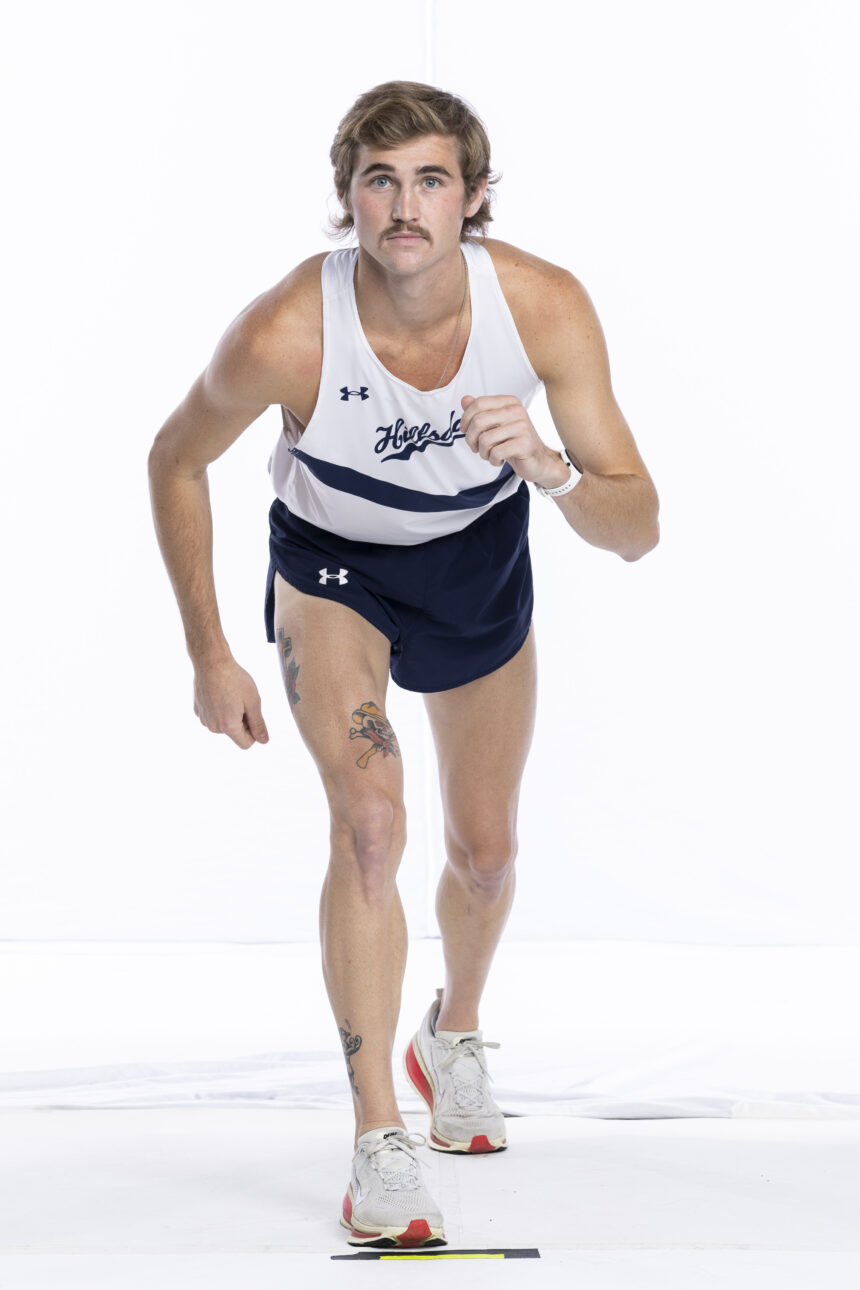 Kuhn crushes mile record